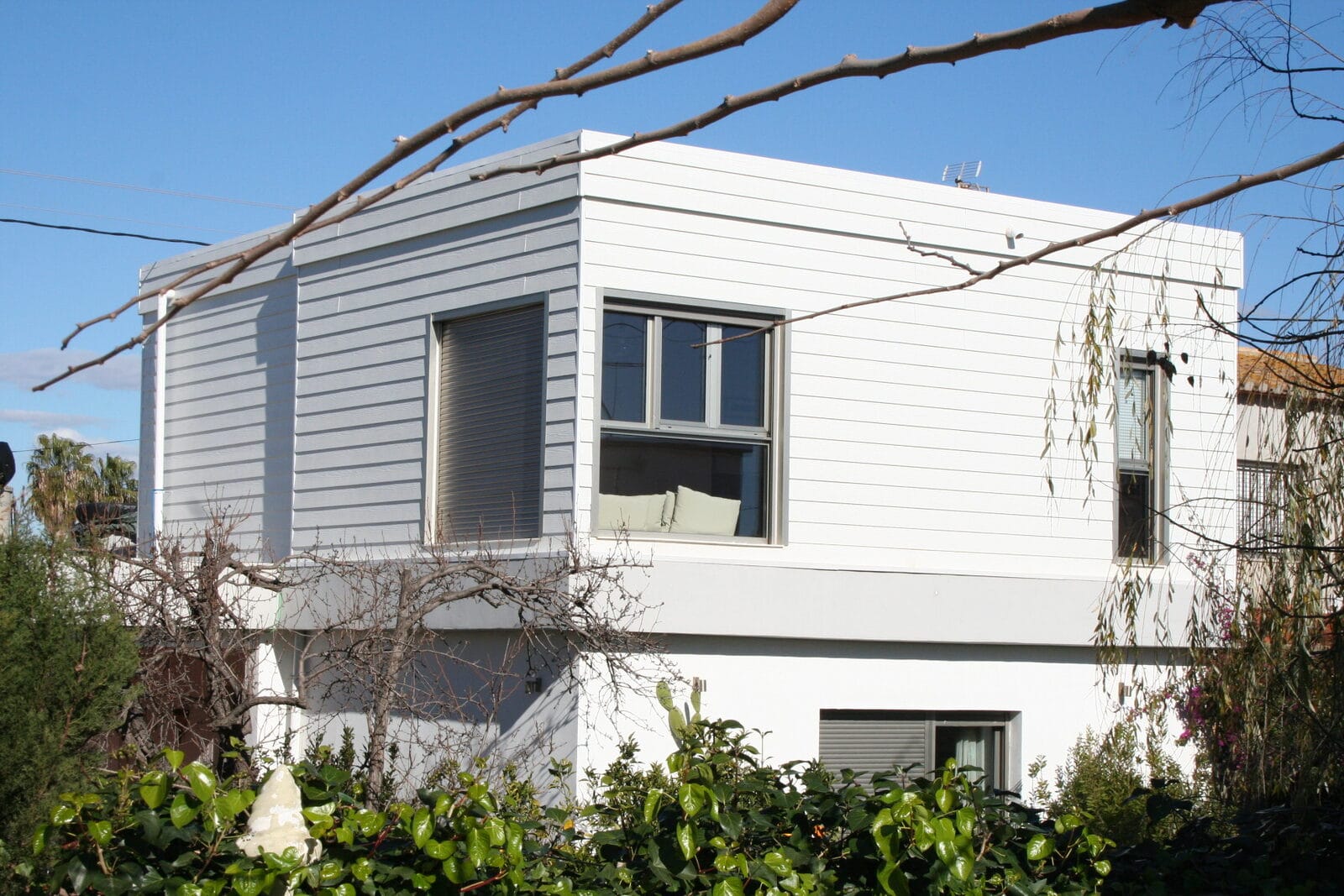 Nueva planta de madera terminada y revestida sobre la vivienda en Burriana Playa, Castellón